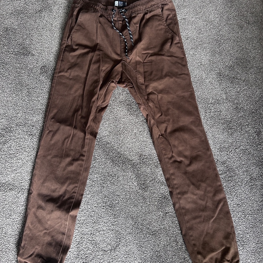 Brown tapered leg pants